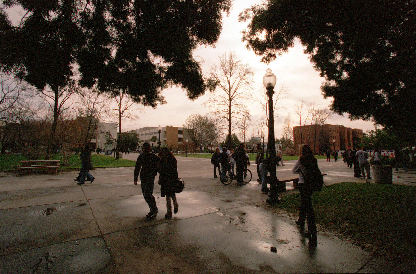Students walk though campus on the first day of the Spring semester at Calif. State University North